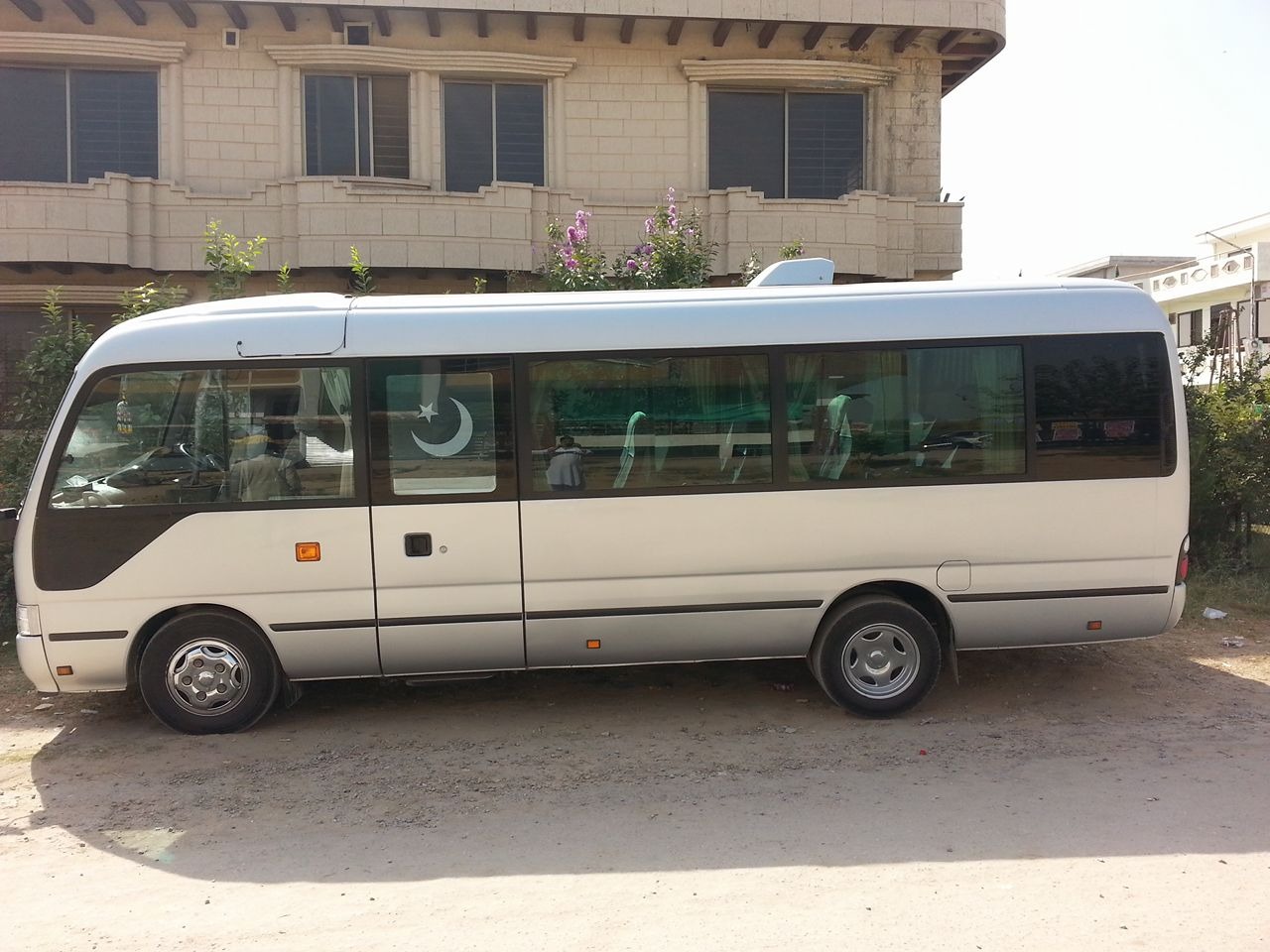 Toyota Coaster Saloon (From Islamabad) w/o fuel